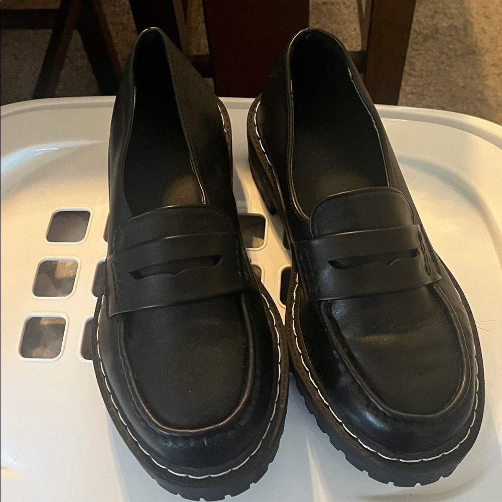 Classic Black Loafers with White Stitching